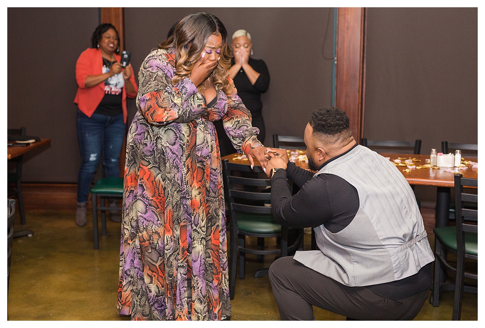 african american woman and man during a surprise proposal in little rock arkansas