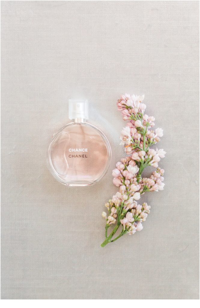 Chanel No 5 Perfume and a beautiful flower