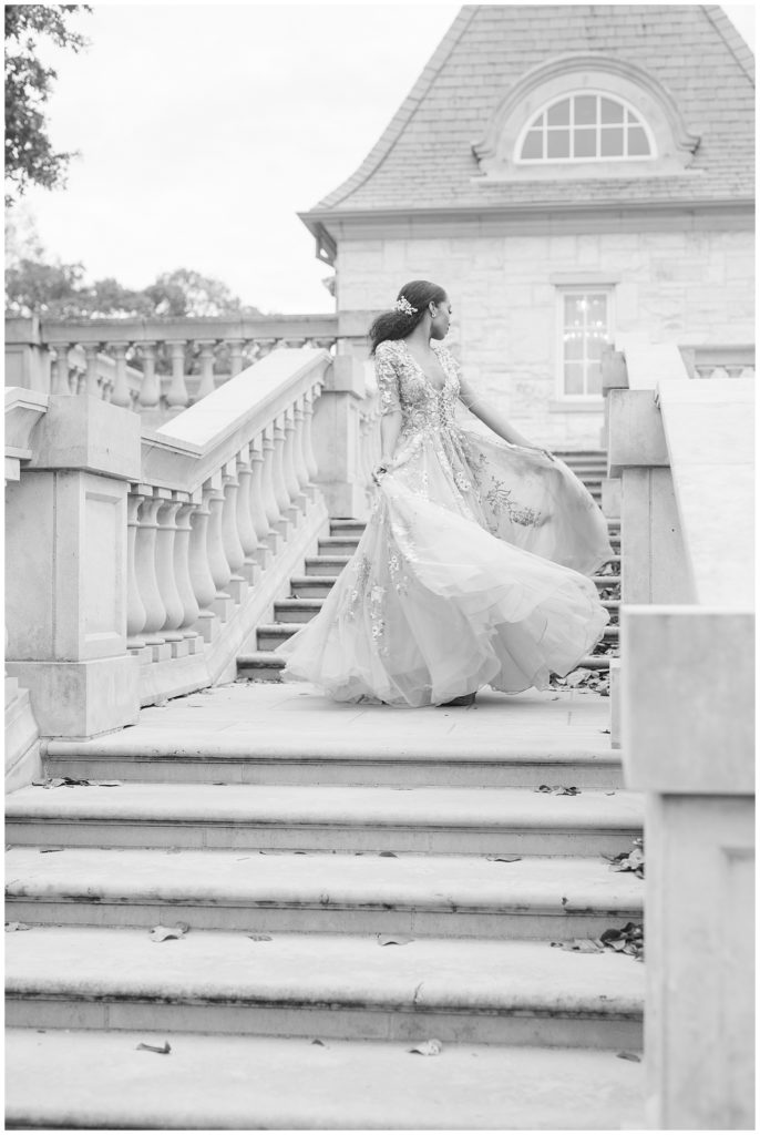 bride walking down steps of the Olana in Hickory Creek Texas.