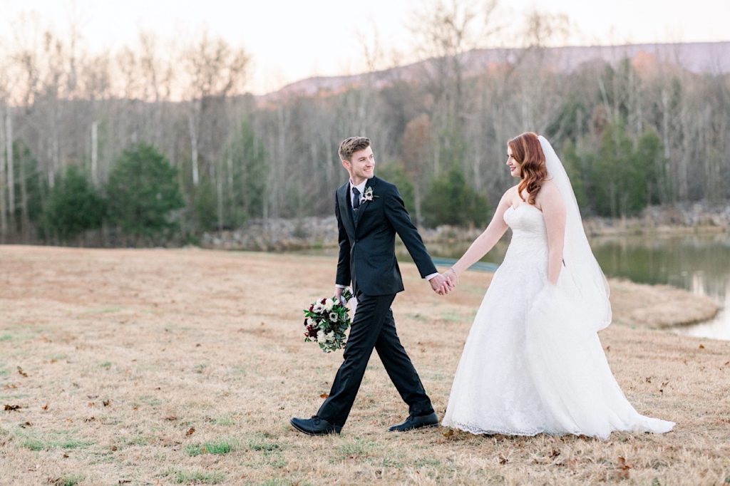 brirde and groom enjoying their wedding at Heritage Acres in Clarksville Arkansas