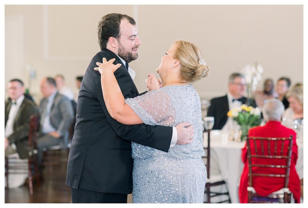 Groom dancing with his mother during wedding at Windsor at Hebron Park in Carrollton Dallas, Texas