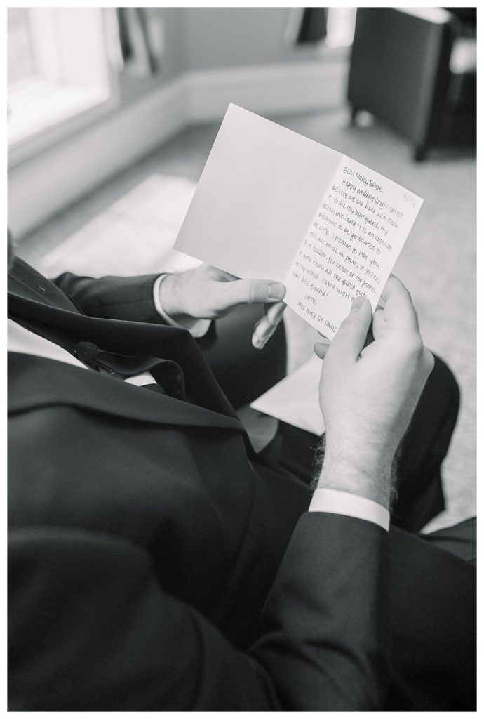 groom reading note from bride during wedding at Windsor at Hebron Park in Carrollton Dallas, Texas