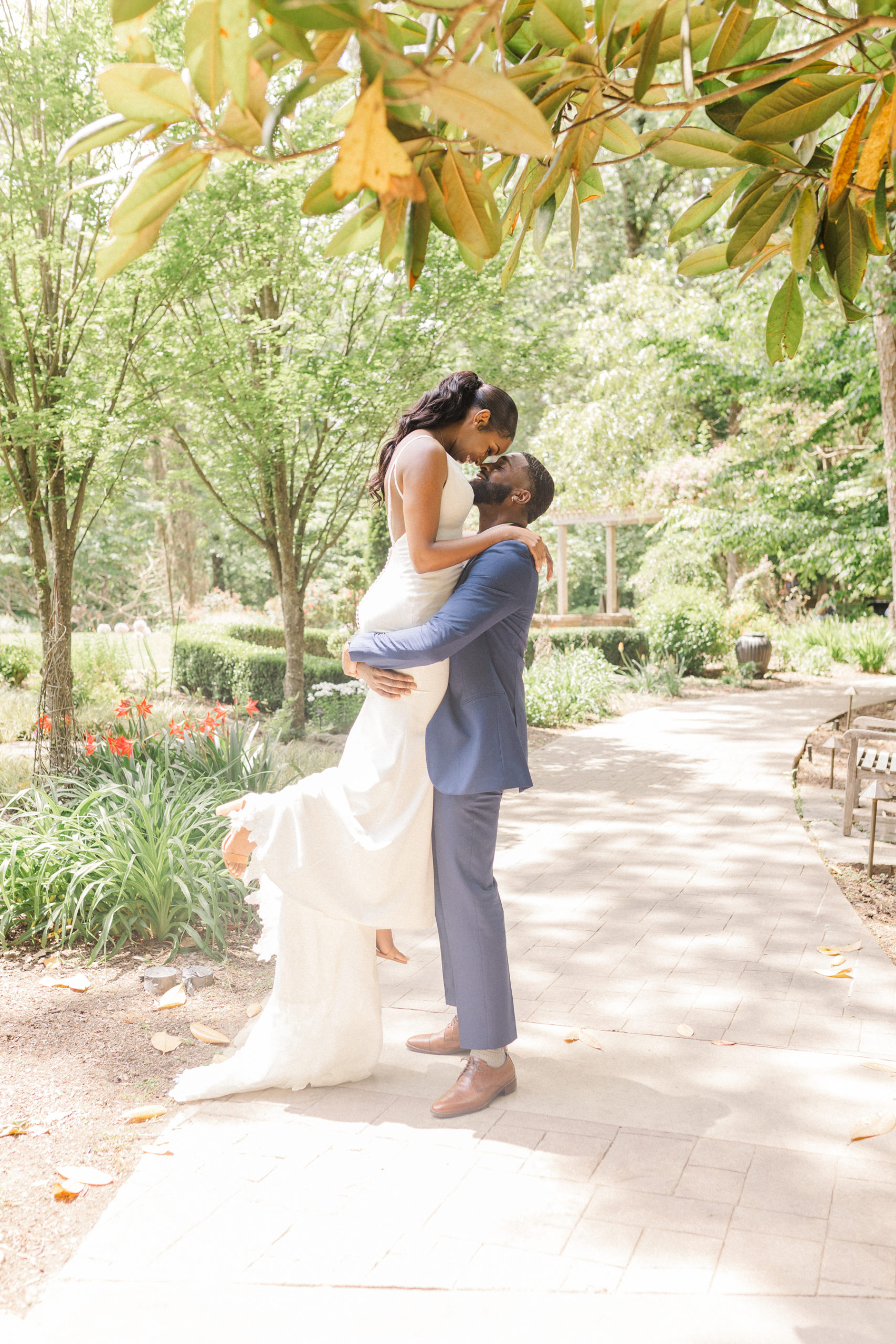 African american bride and groom loving each other during their Garven gardens Hot Springs wedding