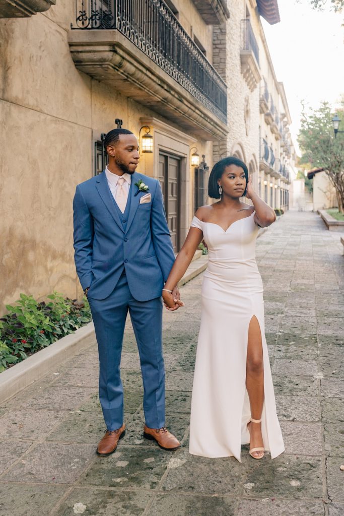 african american couple posing for camera in wedding attire during their dallas texas wedding
