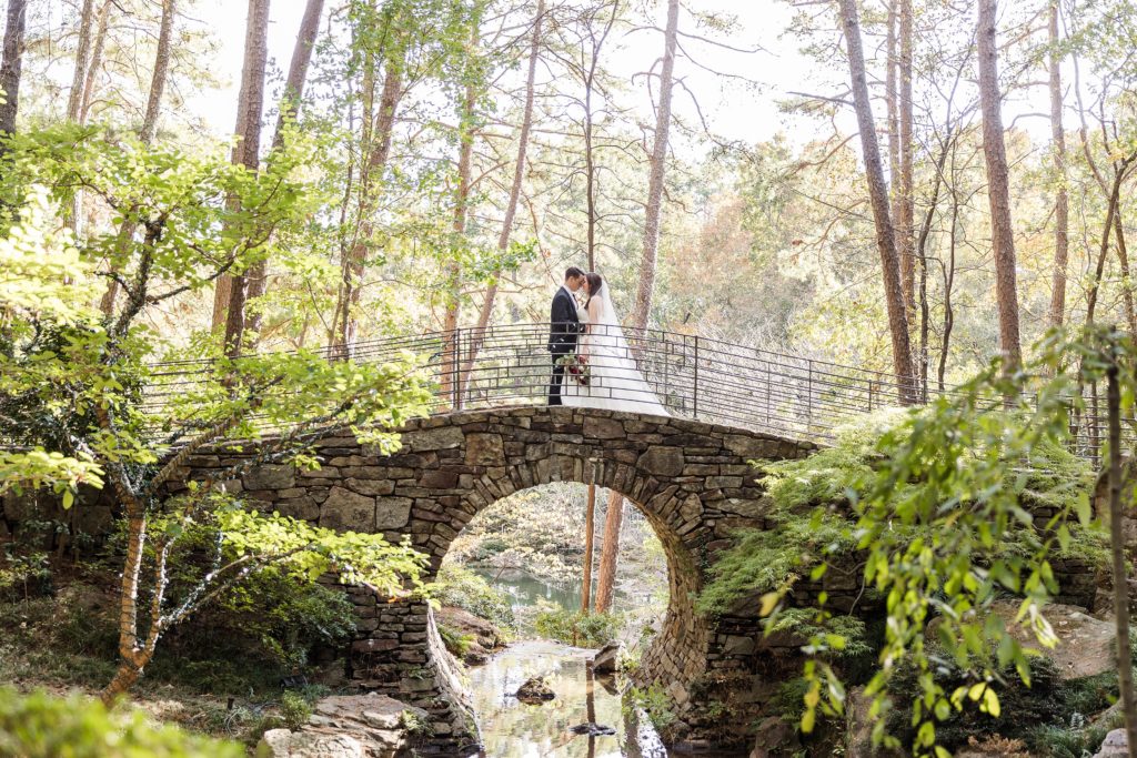 bride and groom sharing a kiss with each other during their hot springs arkansas wedding